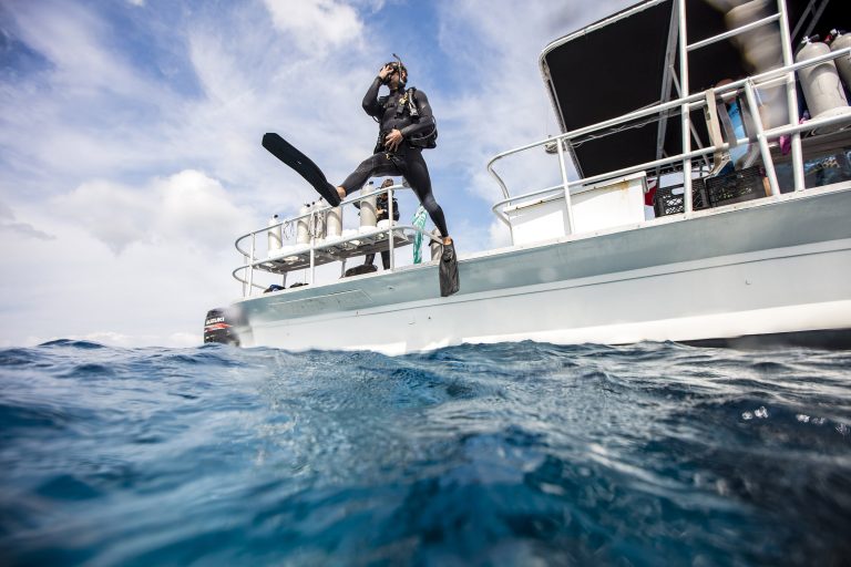 Scuba diving giant stride from boat