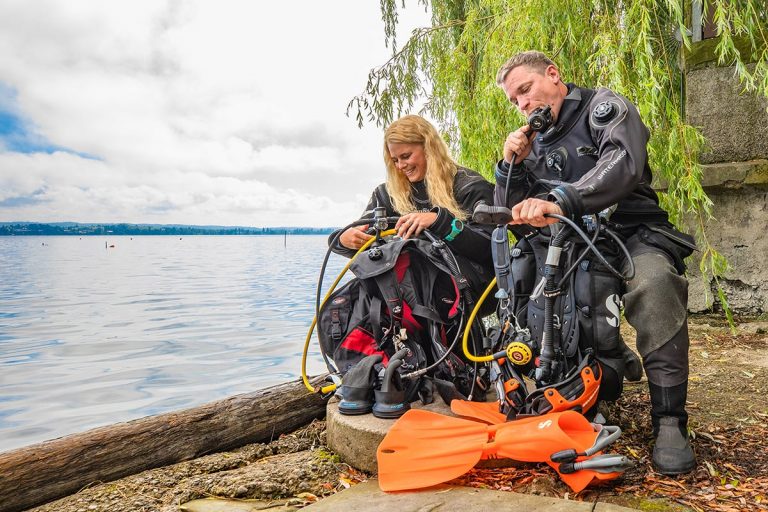 scuba divers testing dive gear